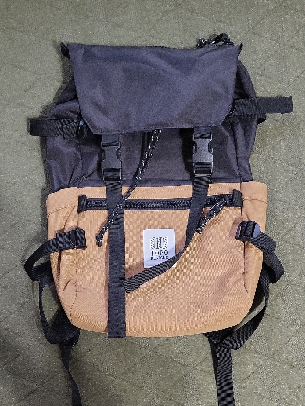 Topo Designs Two-Tone Roll-Top Backpack in Black and Tan